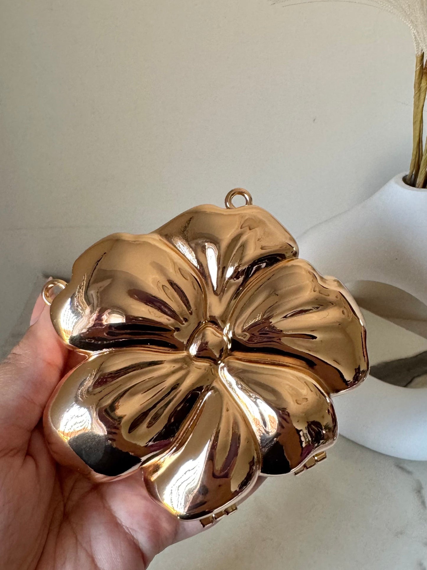 LuxeBloom Metallic Clutch